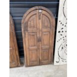 AN INDIAN HARDWOOD DOUBLE DOOR WINDOW SHUTTER WITH ARCHED TOP 21.5 X 48"