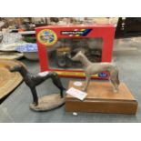 TWO SMALL METALMODELS OF GREYHOUNDS ONE ON A WOODEN PLINTH HEIGHTS 11CM AND 9.5CM