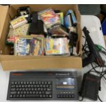 A RETRO SINCLAIR ZX SPECTRUM & LOTS OF GAMES, GUN ACCESSORY ETC