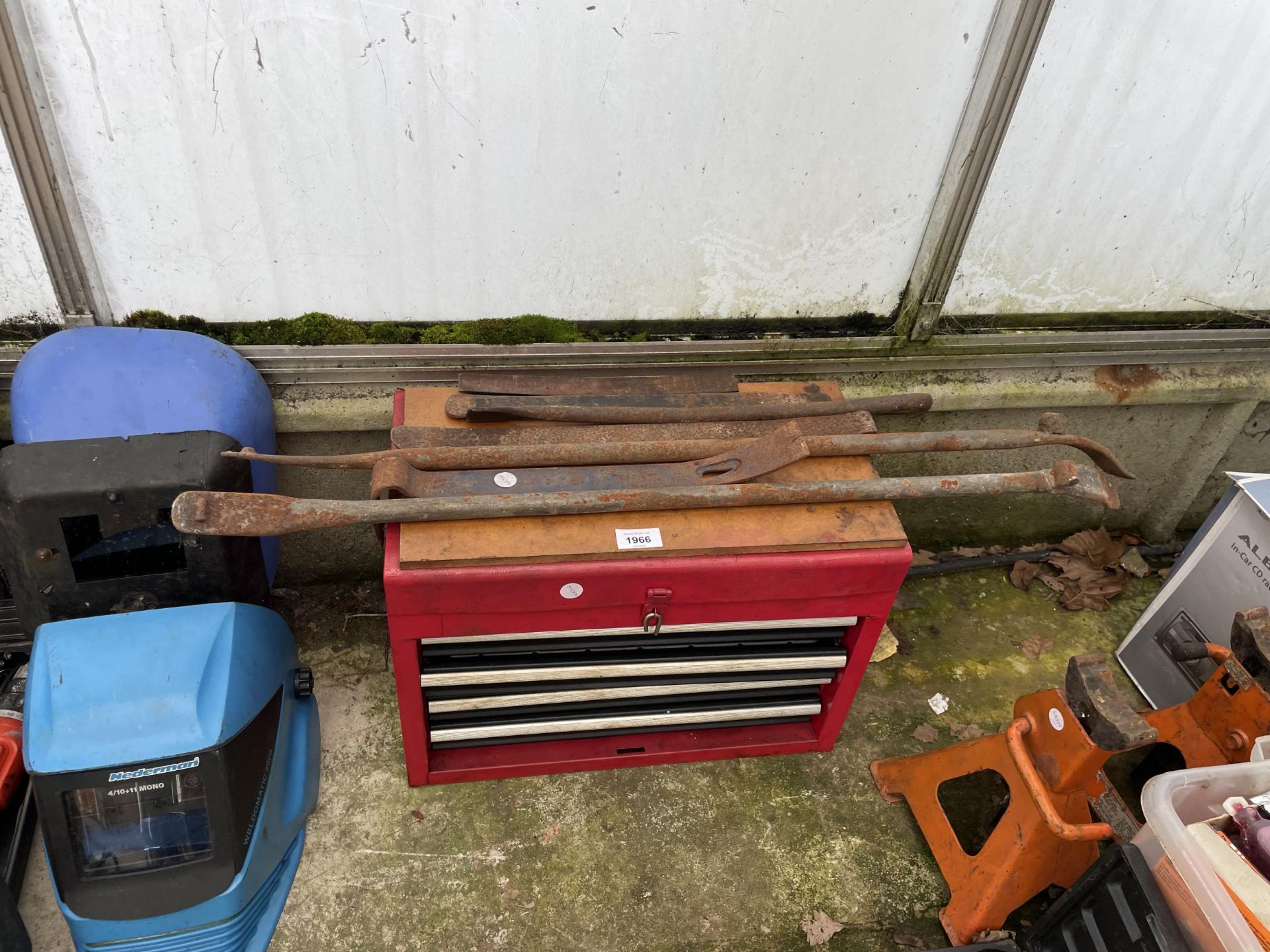 A TOOL CHEST COMPLETE WITH SCREWDRIVERS, HAMMERS, ETC ALONG WITH A SELECTION OF CROWBARS