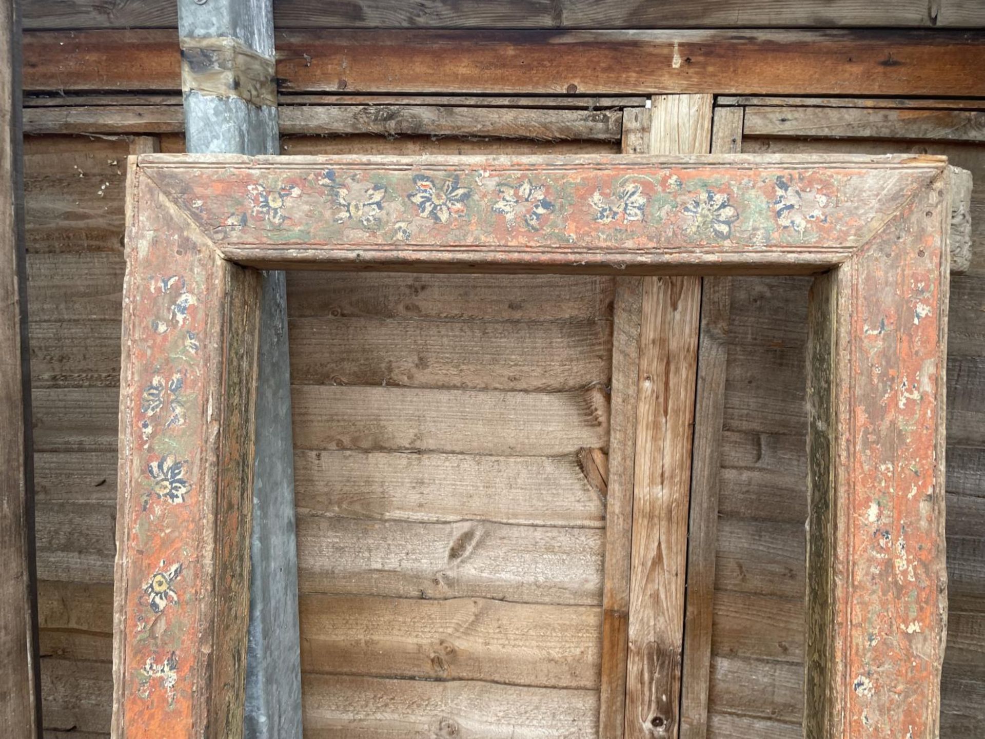 AN INDIAN HARDWOOD FRAME WITH PAINTED FLORAL DECORATION - Image 2 of 4