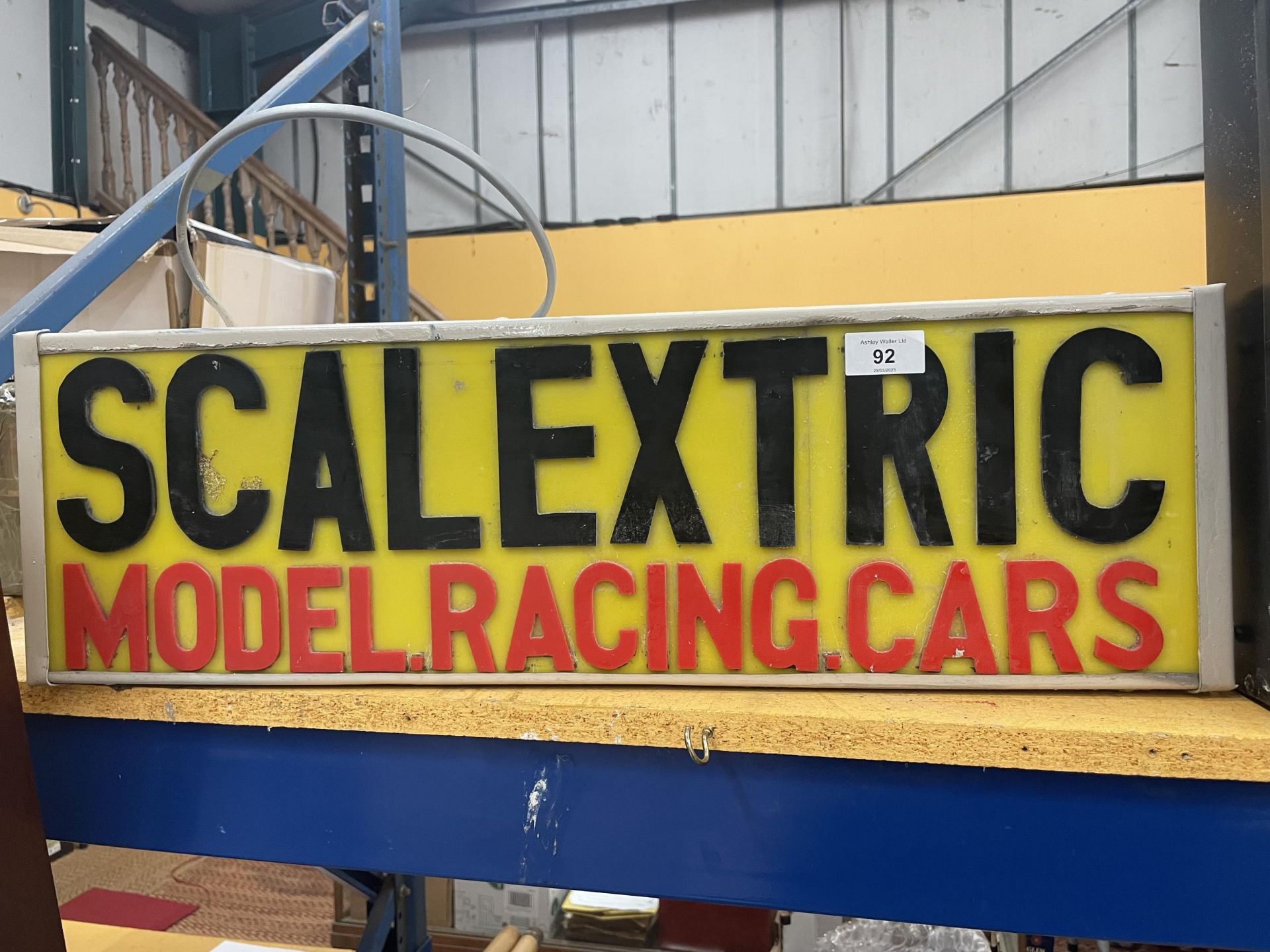 A SCALEXTRIC MODEL RACING CARS ILLUMINATED BOX SIGN