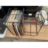 A RECORD RACK AND AN ASSORTMENT OF LP RECORDS