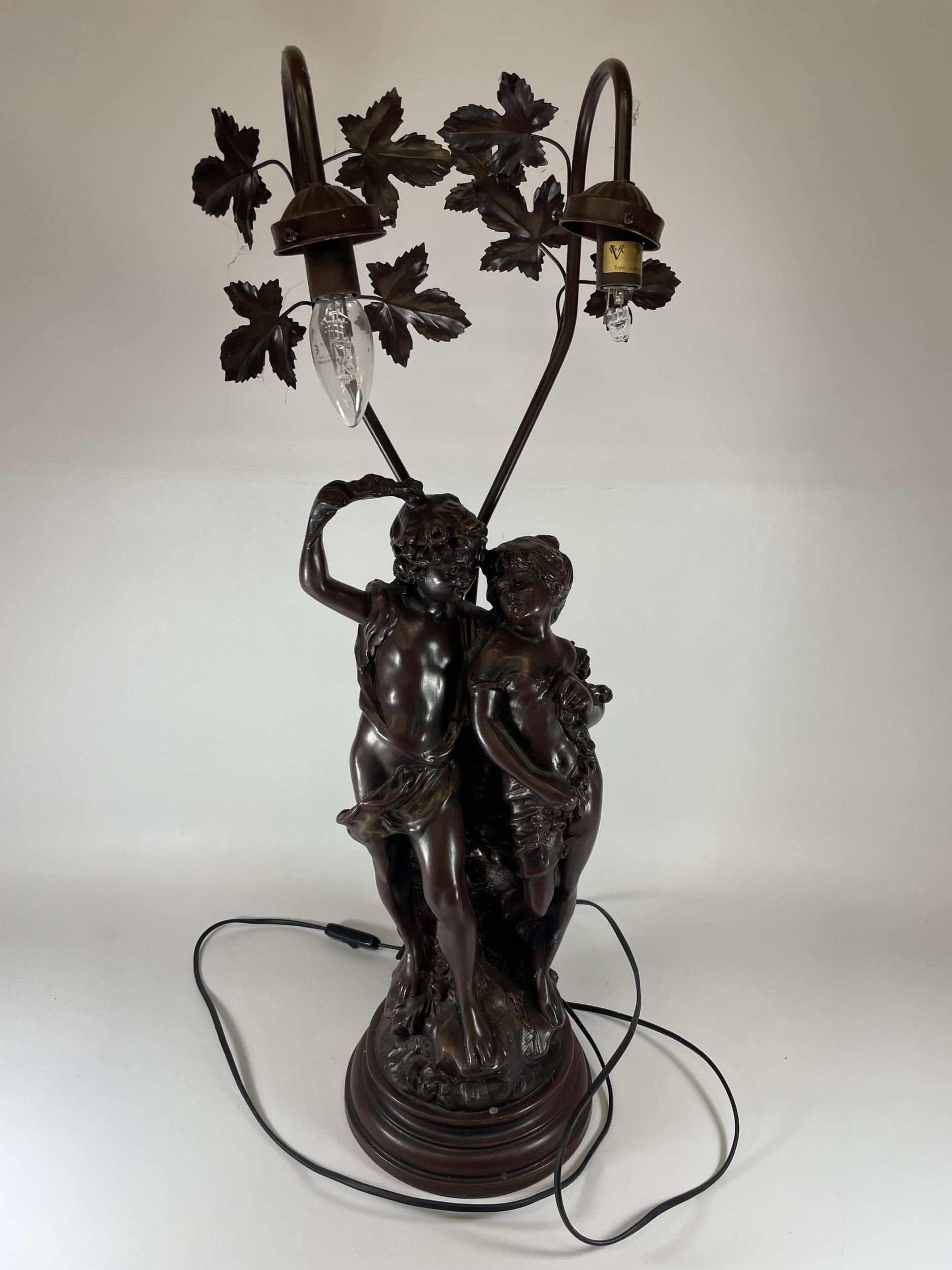 A LARGE SPELTER FIGURAL LAMP WITH FLORAL DESIGN BRANCES, HEIGHT 75CM