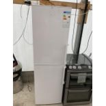 A WHITE UPRIGHT DAEWOO FRIDGE FREEZER BELIEVED IN GOOD WORKING ORDER BUT NO WARRANTY