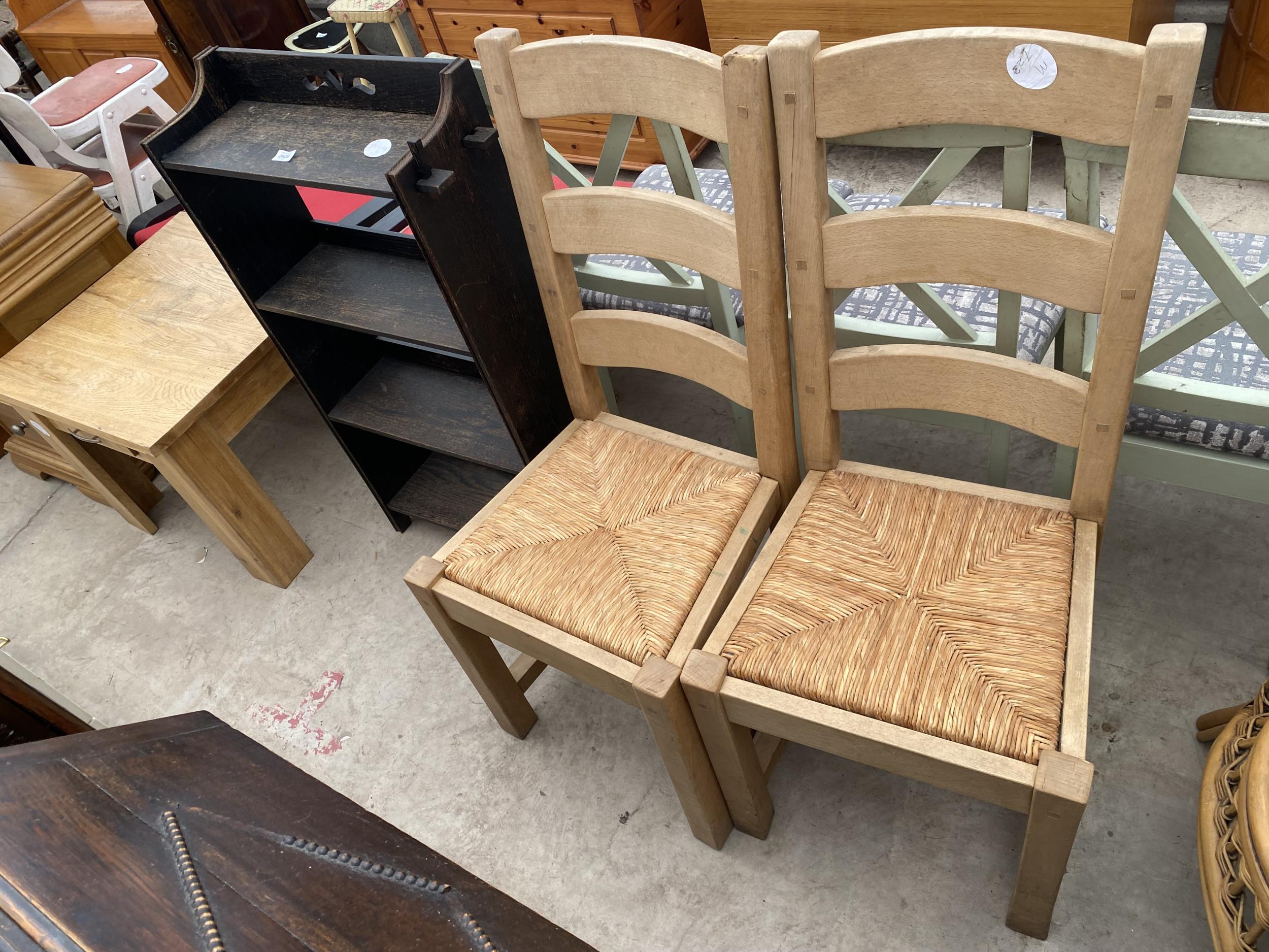 AN EARLY 20TH CENTURY OAK FOUR TIER OPEN BOOKSHELVES, 23" WIDE AND A PAIR OF MODERN LADDERBACK