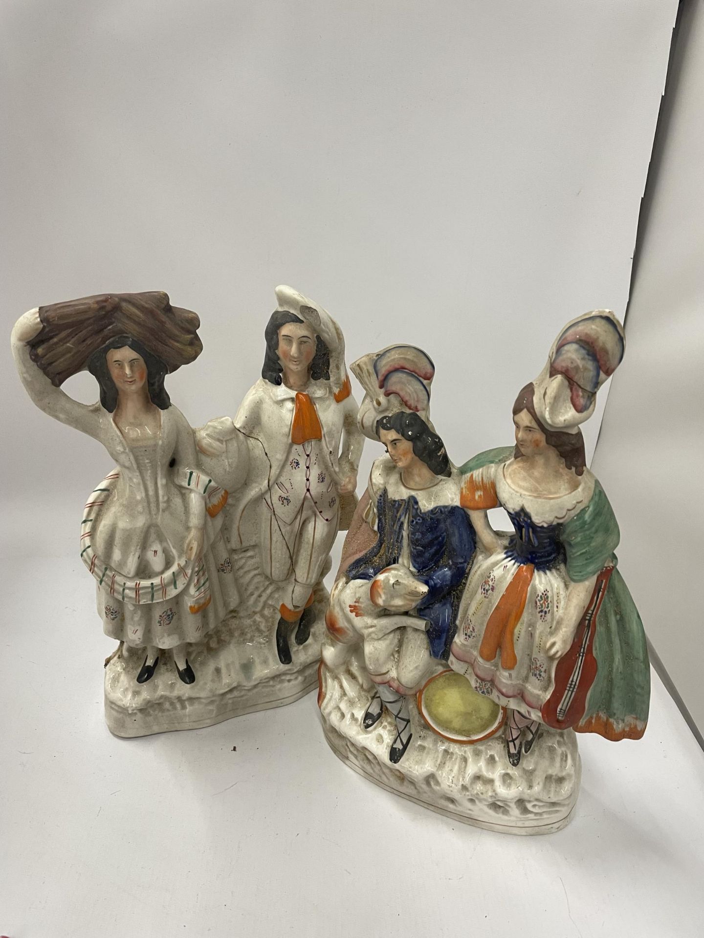 TWO EARLY STAFFORDSHIRE POTTERY FIGURE GROUPS