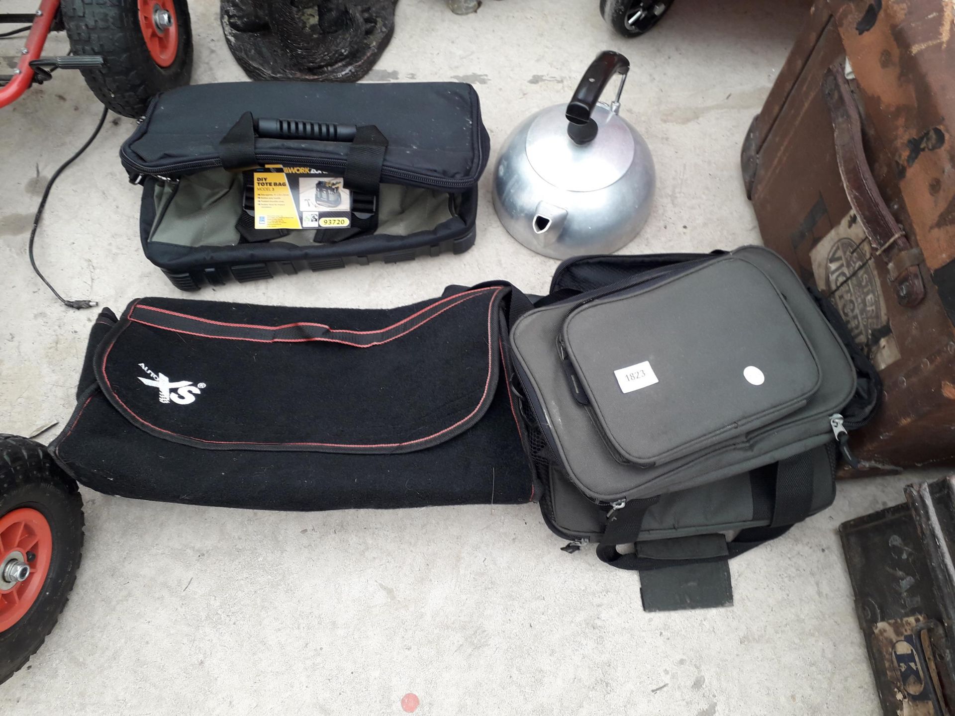 FOUR ITEMS TO INCLUDE AN AS NEW WORKZONE TOOL BAG, A STAINLESS STEEL KETTLE AND TWO FURTHER BAGS