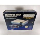 A BOXED RETRO NINTENDO NES VERSION CONTROL DECK ENTERTAINMENT SYSTEM CONSOLE
