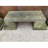 A YORK STONE GARDEN BENCH WITH PEDESTAL BASES (L:128CM H:41CM)