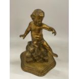 A GILT EFFECT CHERUB FIGURE