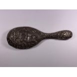 A HALLMARKED SILVER BACKED DRESSING HAND MIRROR