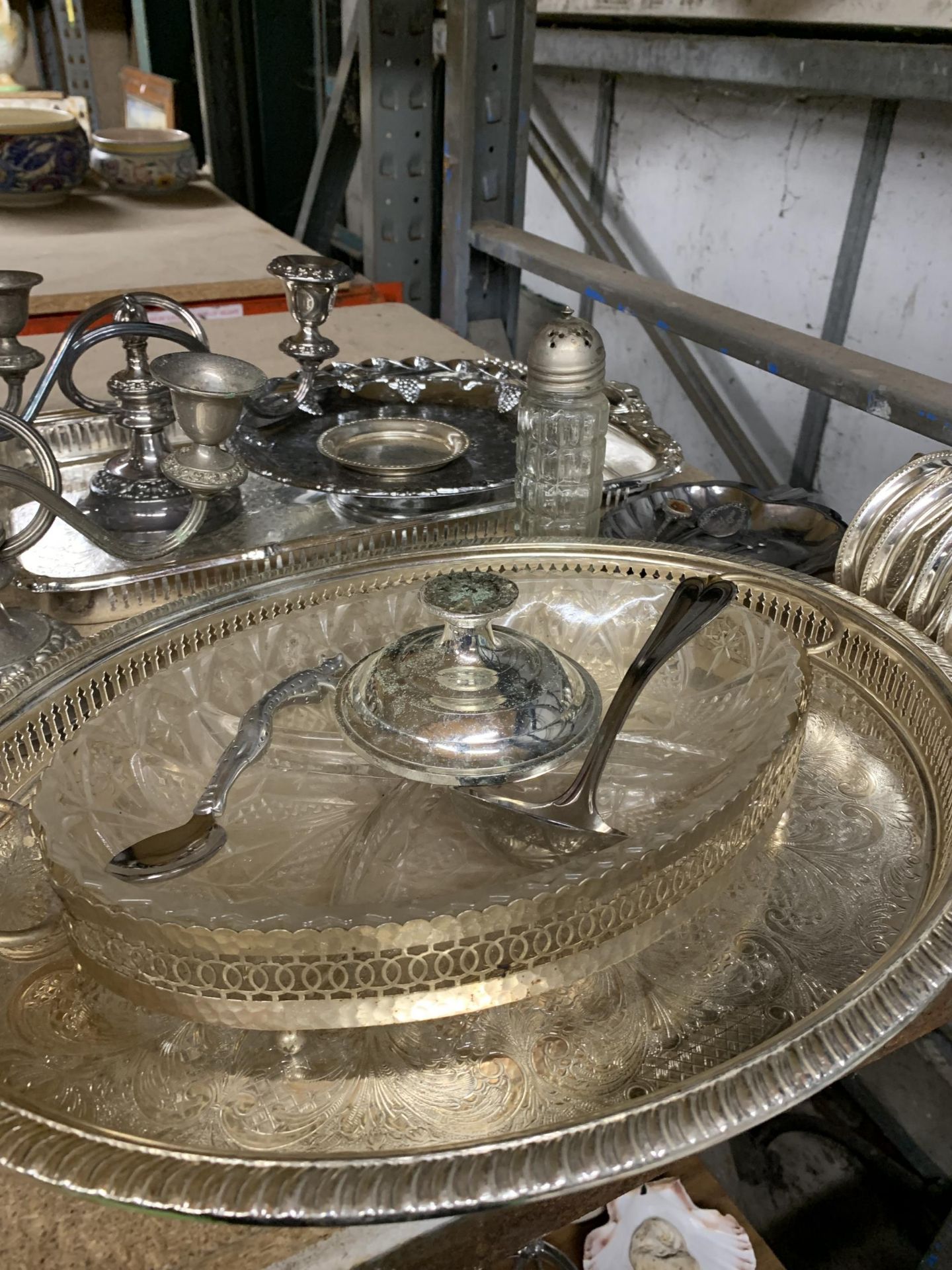 A QUANTITY OF SILVER PLATE TO INCLUDE TRAYS, CANDLEABRA'S, SALT & PEPPER, FLOUR SHAKER, ETC., - Image 3 of 4