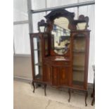 AN EDWARDIAN MAHOGANY AND INLAID DOUBLE BOWFRONTED CHINA CABINET, 55" WIDE