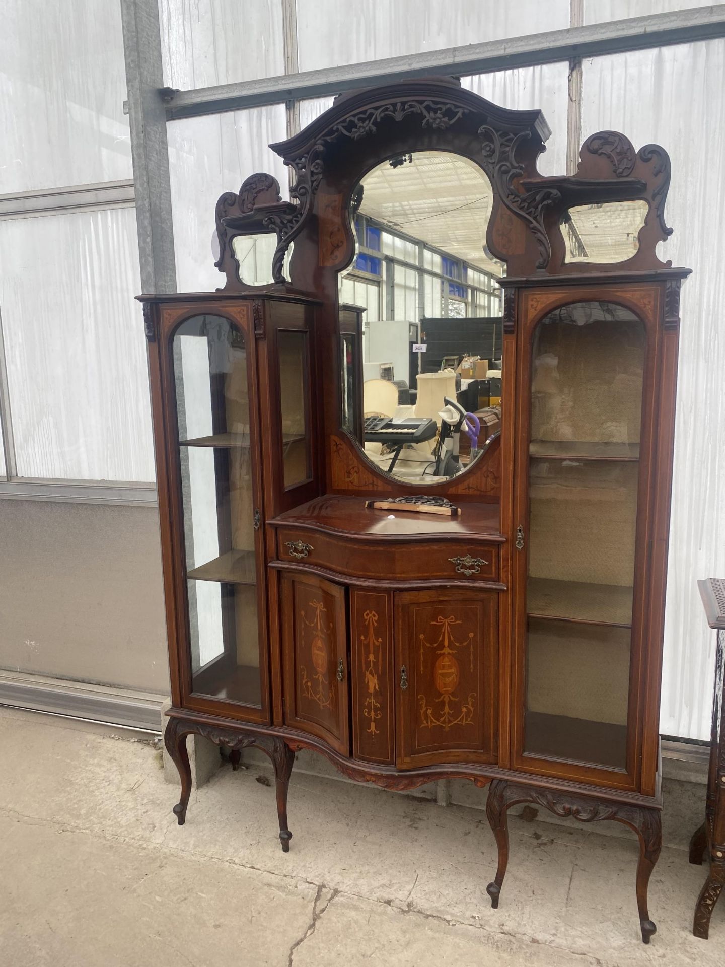 AN EDWARDIAN MAHOGANY AND INLAID DOUBLE BOWFRONTED CHINA CABINET, 55" WIDE