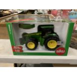 A BOXED SIKU MODEL OF A JOHN DEERE 8R- 370 TRACTOR REF NO 43329 SCALE 1:32