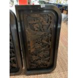 A LARGE HEAVILY CARVED ORIENTAL PLAQUE DEPICTING WARRIOR DESIGN, 91 X 46CM