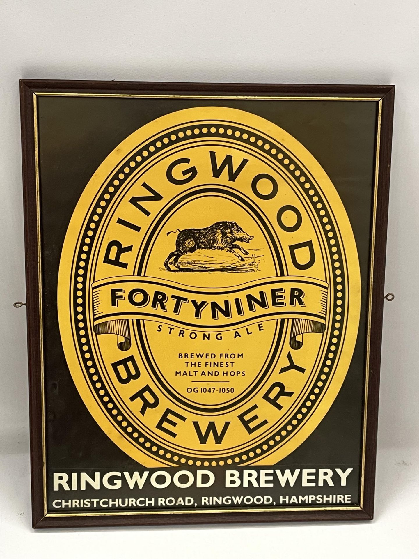 A VINTAGE RINGWOOD BREWERY FRAMED POSTER