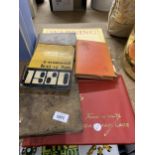 A MIXED LOT TO INCLUDE A VINTAGE CIGARETTE CARD ALBUM WITH SOME PHOTOGRAPHIC CARDS, CAR BOOKS, A