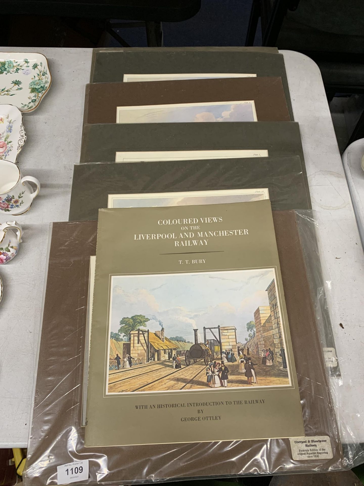 FIVE PRINTS AND A BOOK RELATING TO THE OPENING OF THE FIRST MANCHESTER TO LIVERPOOL RAILWAY