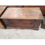 AN INDIAN HARDWOOD DOWRY CHEST WITH METAL STRAPS, 25" WIDE