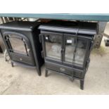 TWO ELECTRIC HEATERS IN THE FORM OF LOG BURNERS