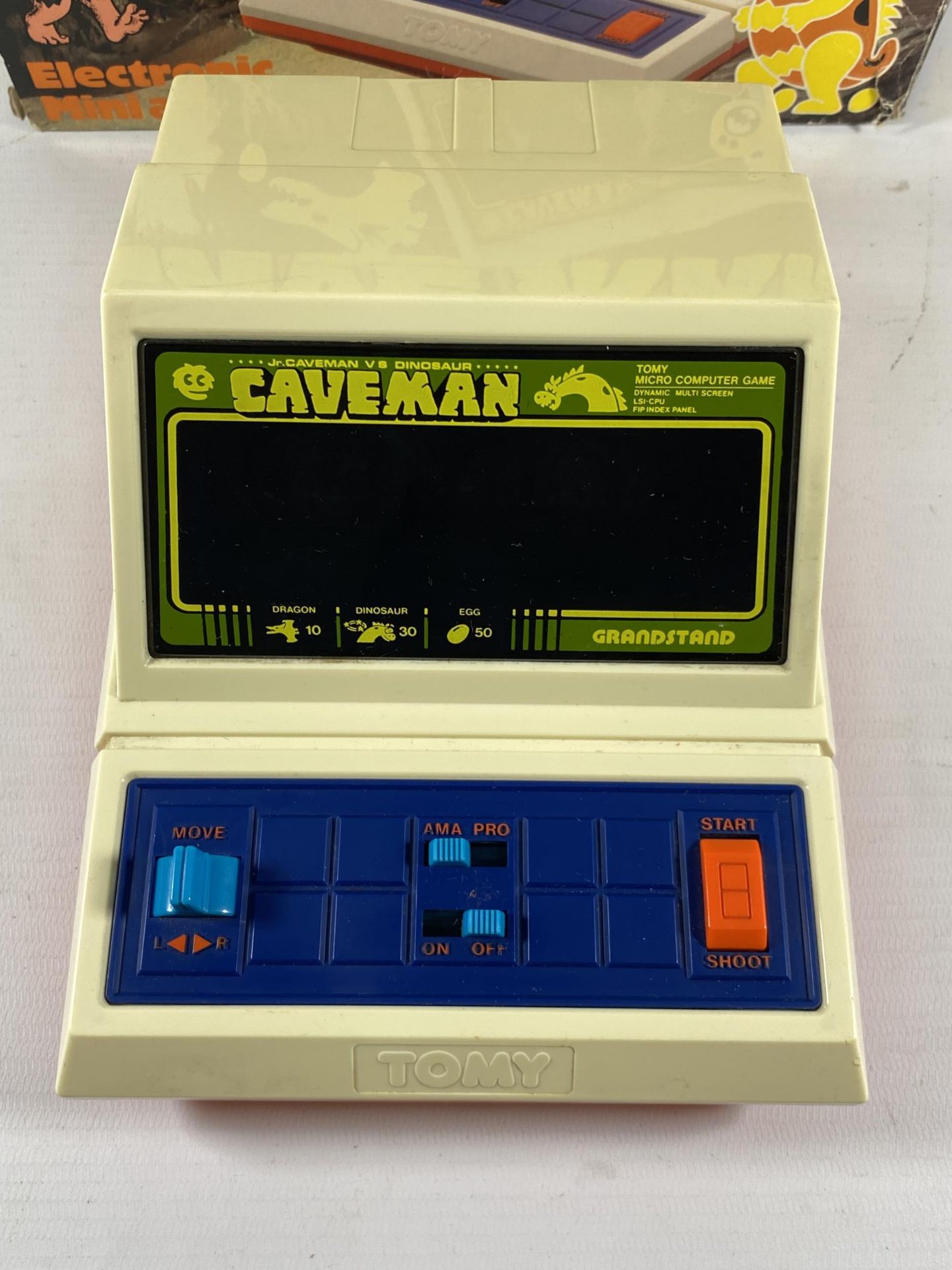 A RETRO BOXED GRANDSTAND CAVE MAN ELECTRONIC MINI ARCADE GAME - Image 2 of 3