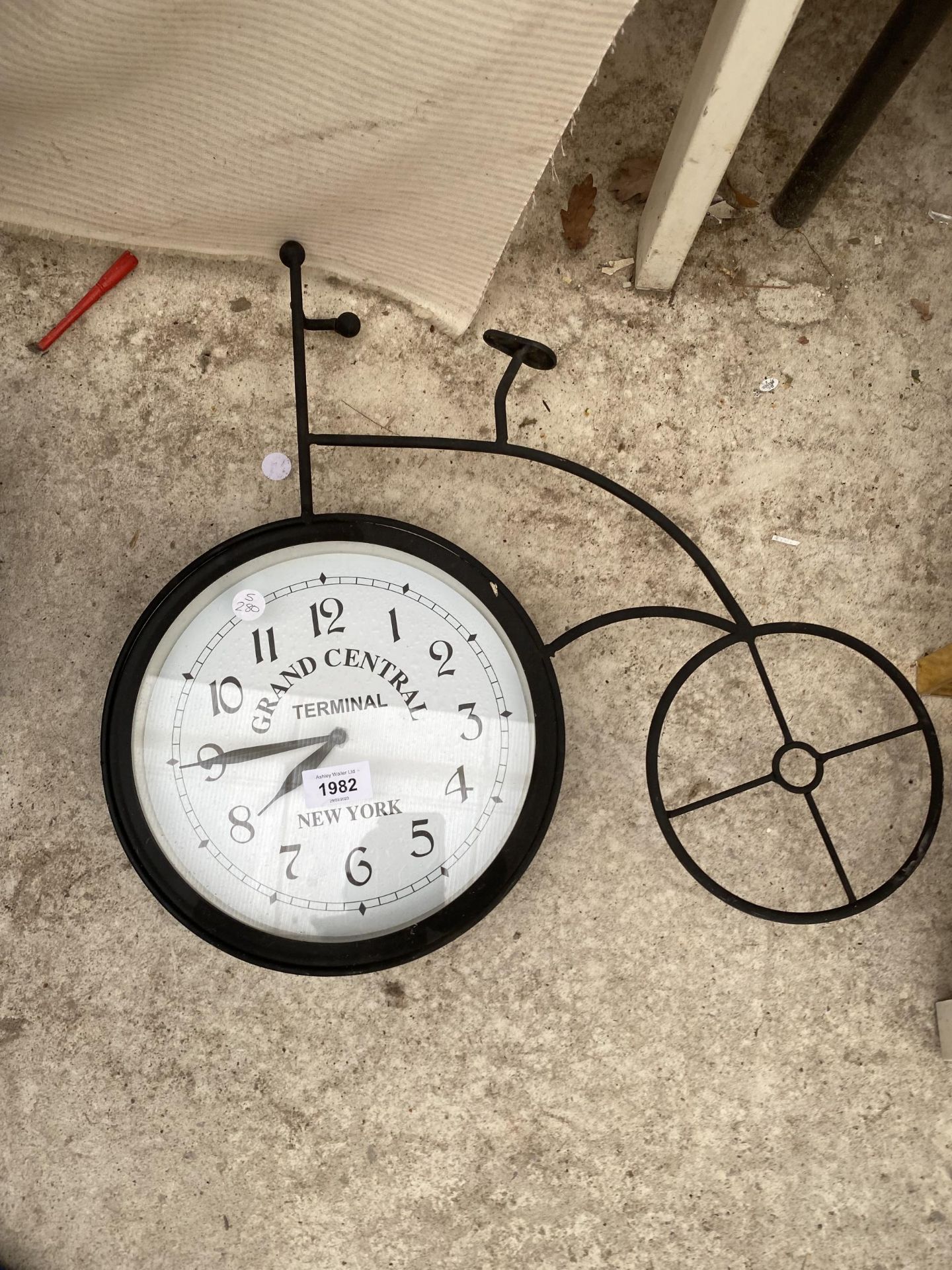 A 'GRAND CENTRAL TERMINAL' CLOCK IN THE SHAPE OF A PENNY FARTHING