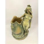 AN ART NOUVEAU STONEWARE FIGURE OF A GIRL, IMPRESSED MARKS TO BASE & SIGNED J.SCHOOP