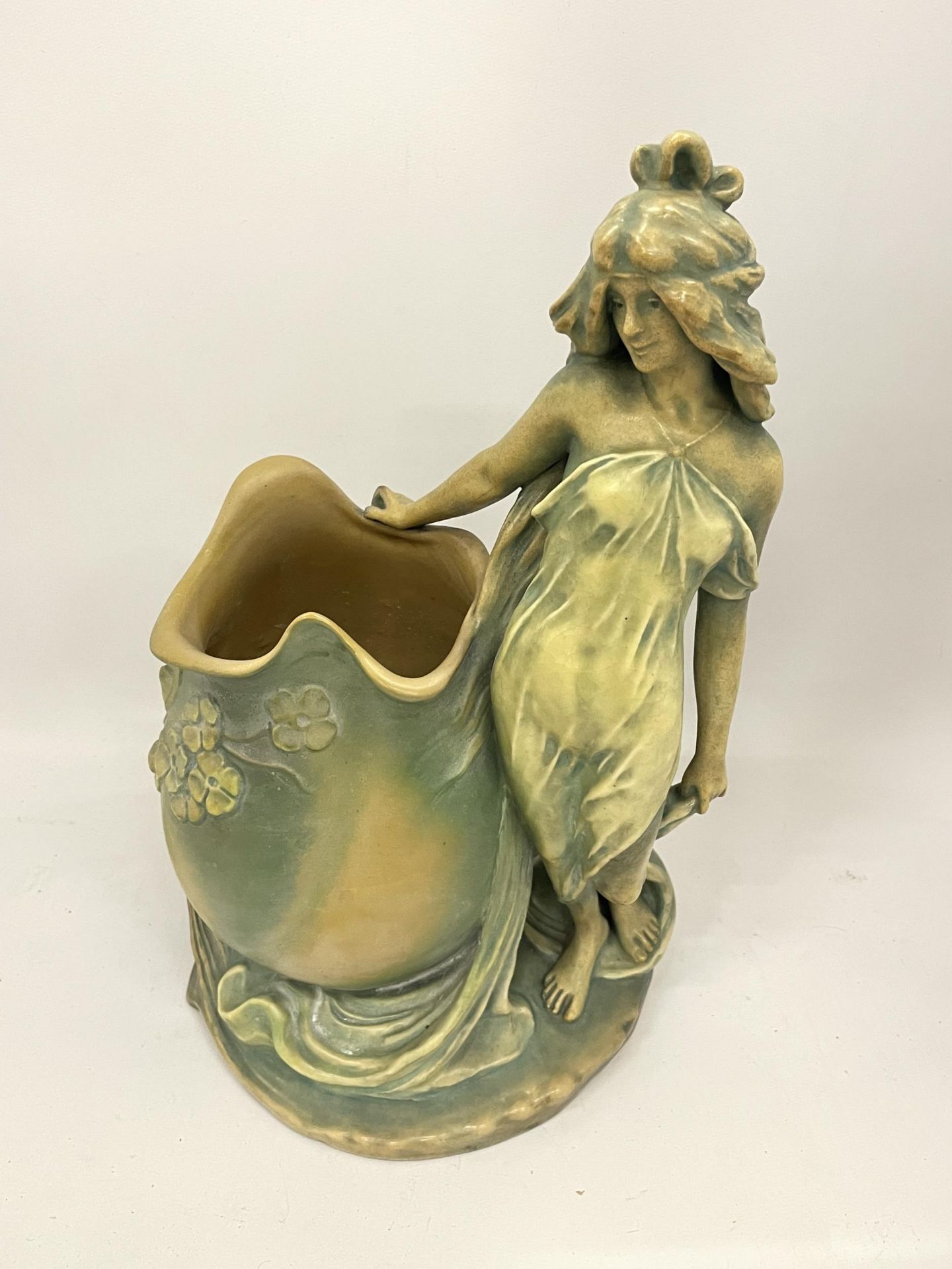 AN ART NOUVEAU STONEWARE FIGURE OF A GIRL, IMPRESSED MARKS TO BASE & SIGNED J.SCHOOP