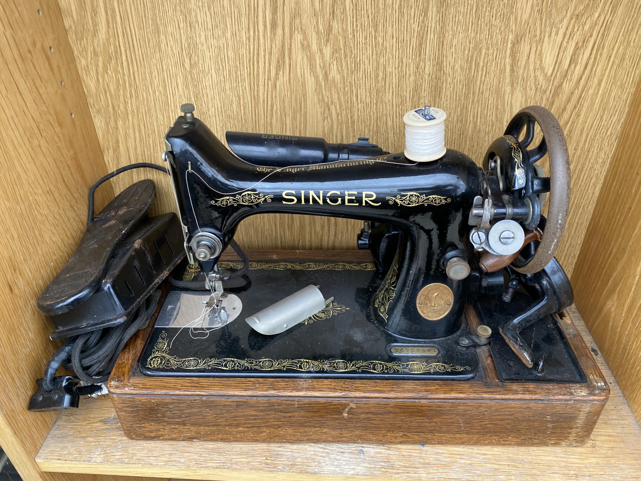 A VINTAGE SINGER SEWING MACHINE CONVERTED TO ELECTRIC AND WITH WOODEN CARRY CASE - Image 2 of 3