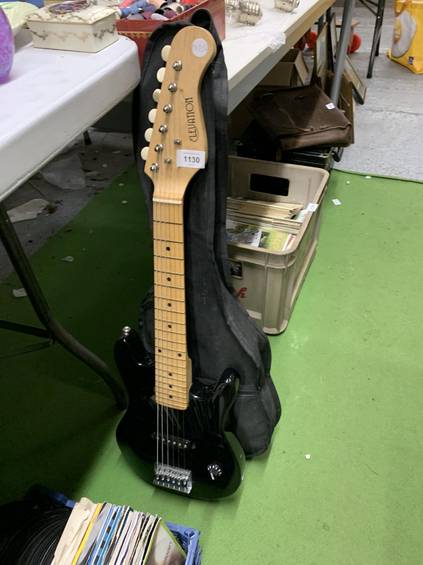 AN ELEVATION CHILD'S ELECTRIC GUITAR AND CASE