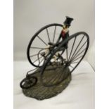 A NOVELTY TWIN PENNY FARTHING FIGURE, HEIGHT 32CM