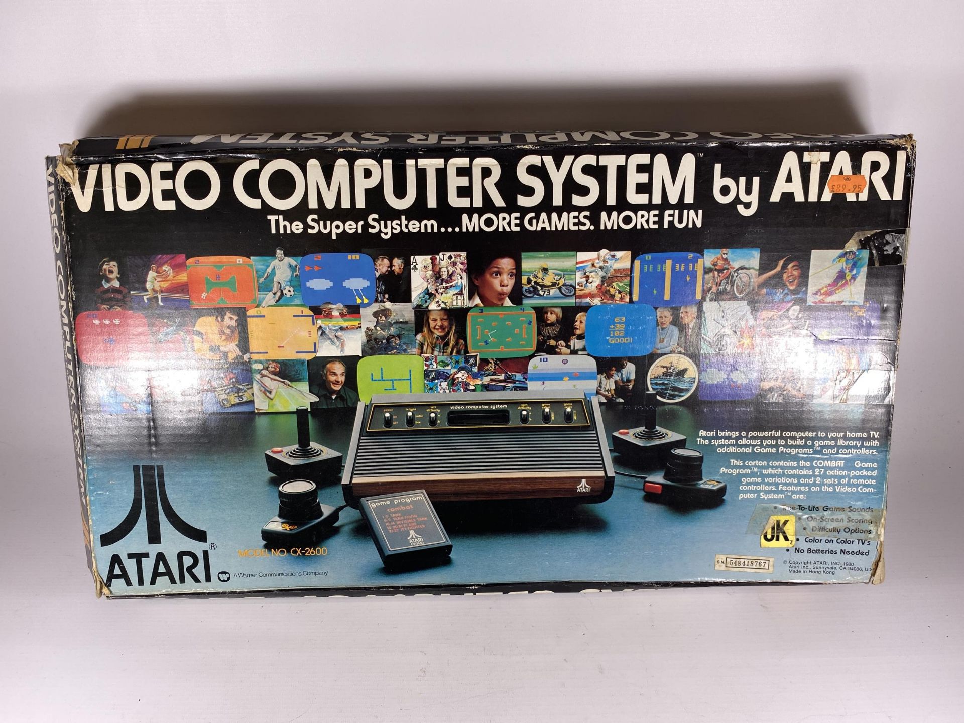 A BOXED RETRO ATARI VIDEO COMPUTER SYSTEM CONSOLE