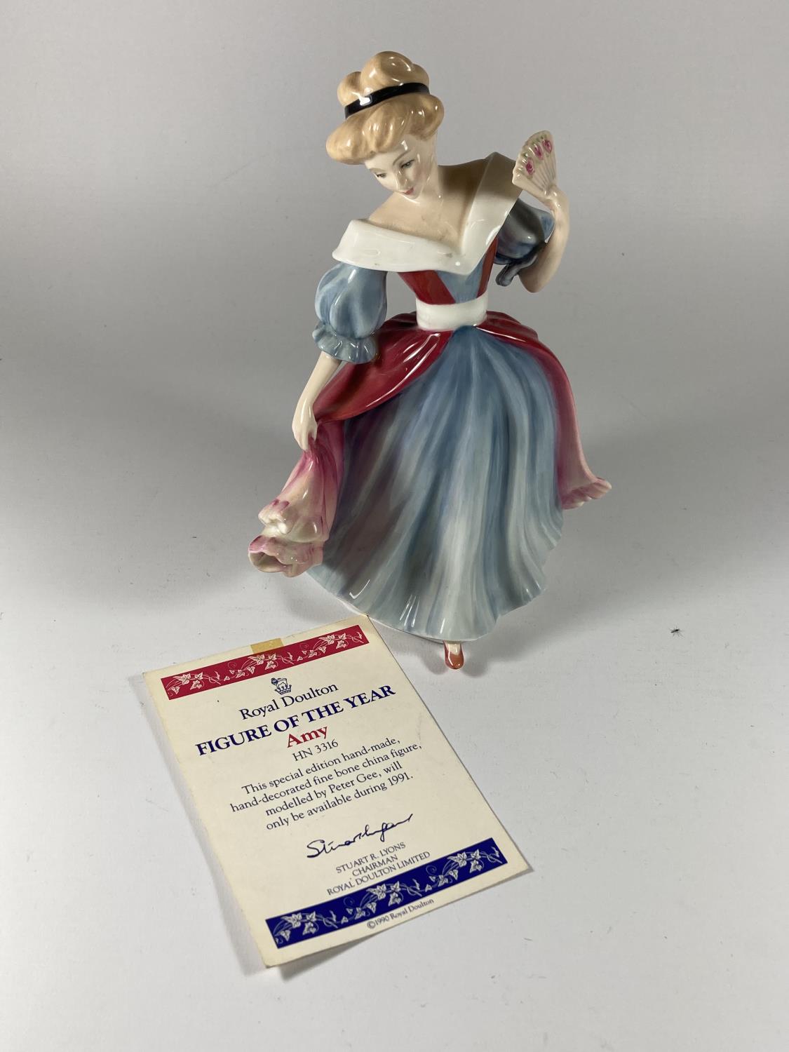 A ROYAL DOULTON FIGURE AMY WITH CERTIFICATE