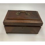 AN EDWARDIAN INLAID MAHOGANY JEWELLERY BOX WITH BRASS HANDLE AND INNER PULL OUT FELT LINED TRAY