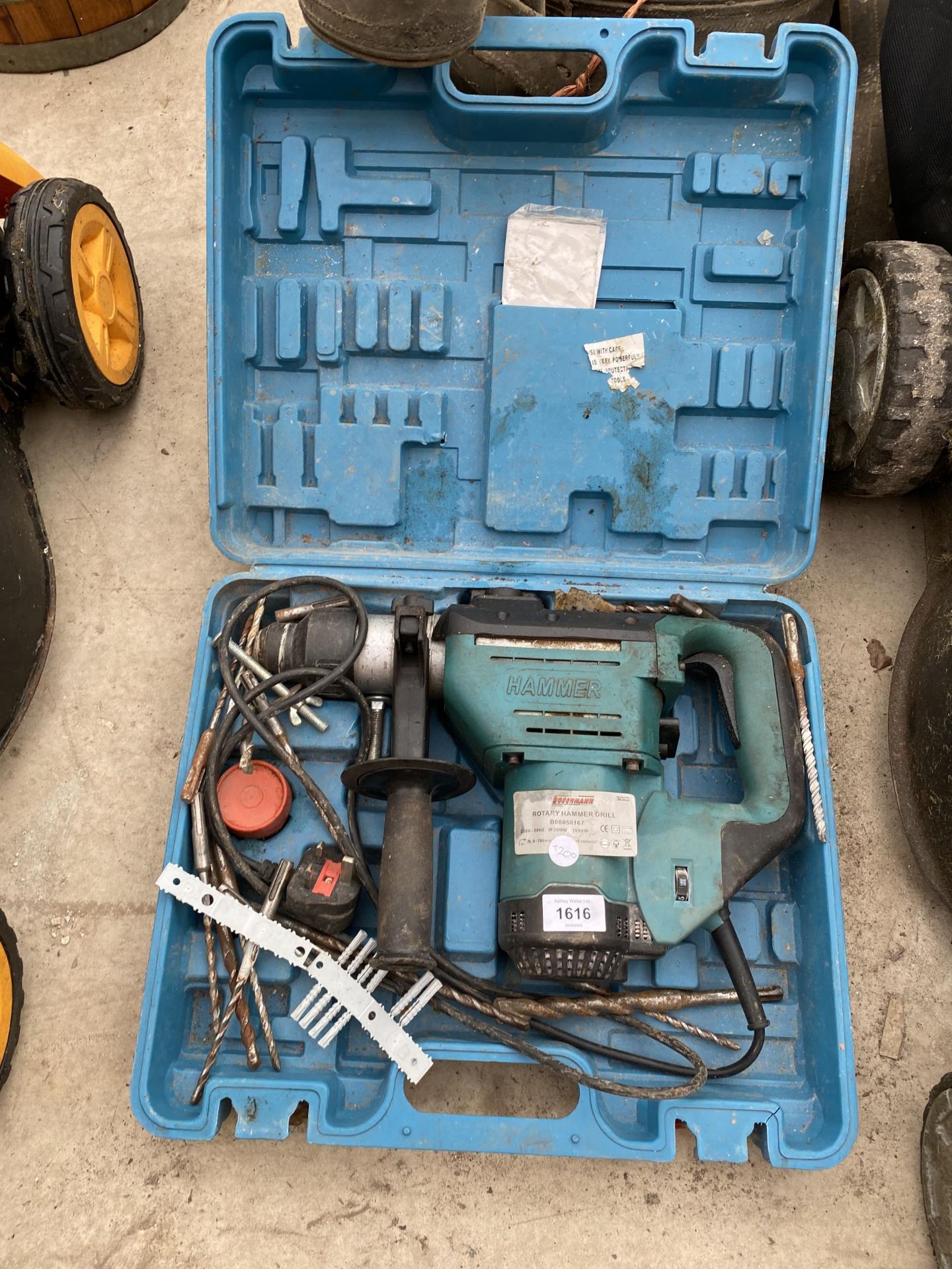 A BOXED ELECTRIC HAMMER DRILL