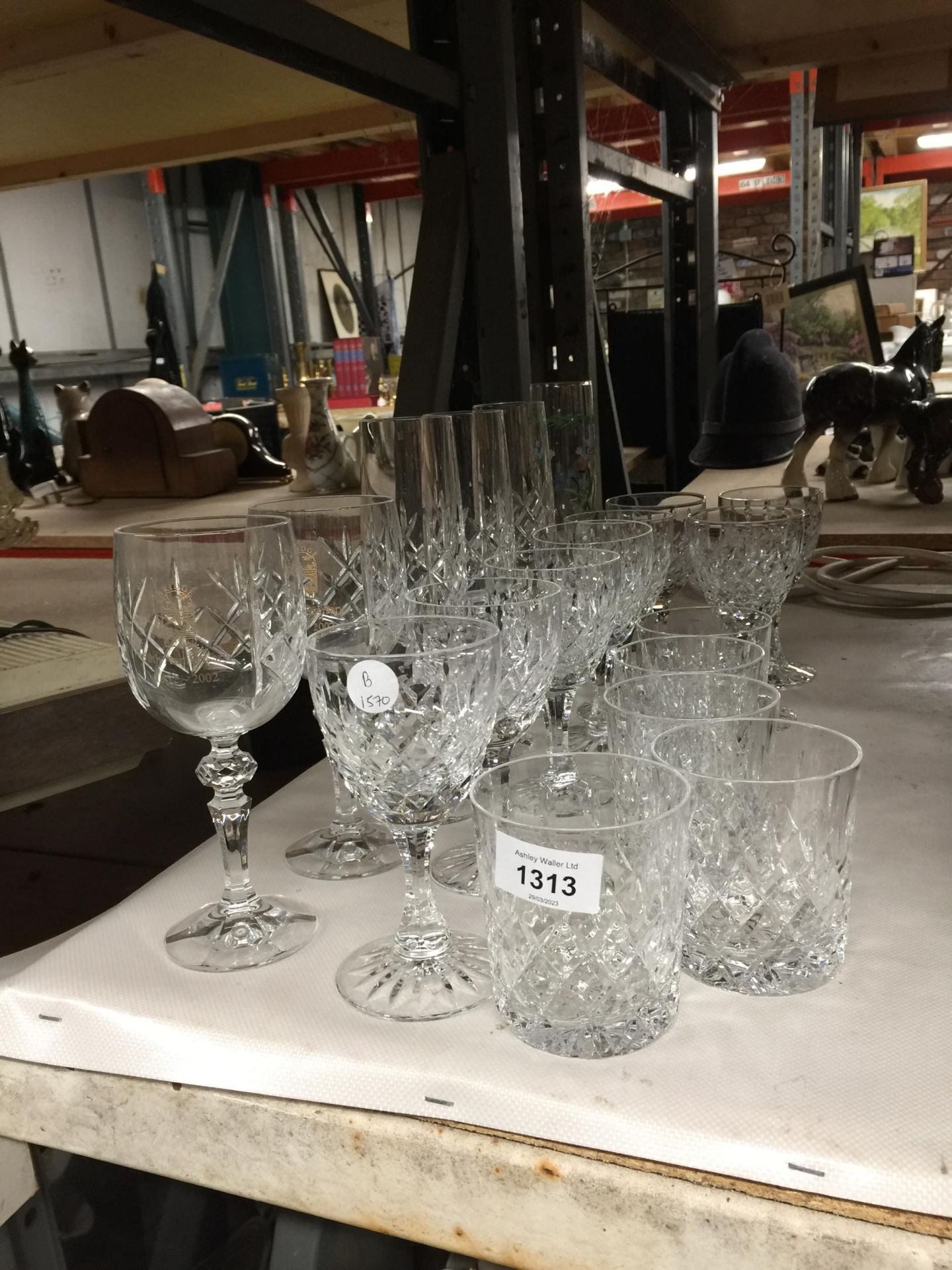 A QUANTITY OF CRYSTAL WINE GLASSES, FLUTES AND TUMBLERS