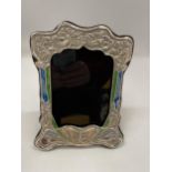 AN ART NOUVEAU STYLE STERLING SILVER AND ENAMEL PHOTO FRAME