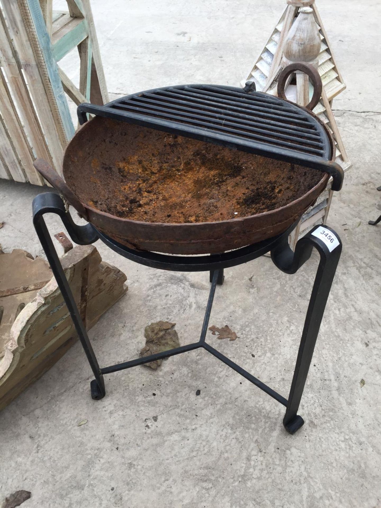 A MODERN CAST METAL FIRE PIT, 16" DIAMETER