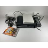 AN XBOX 360 CONSOLE & NINTENDO WII CONSOLE & GUITAR HERO LEGENDS OF ROCK