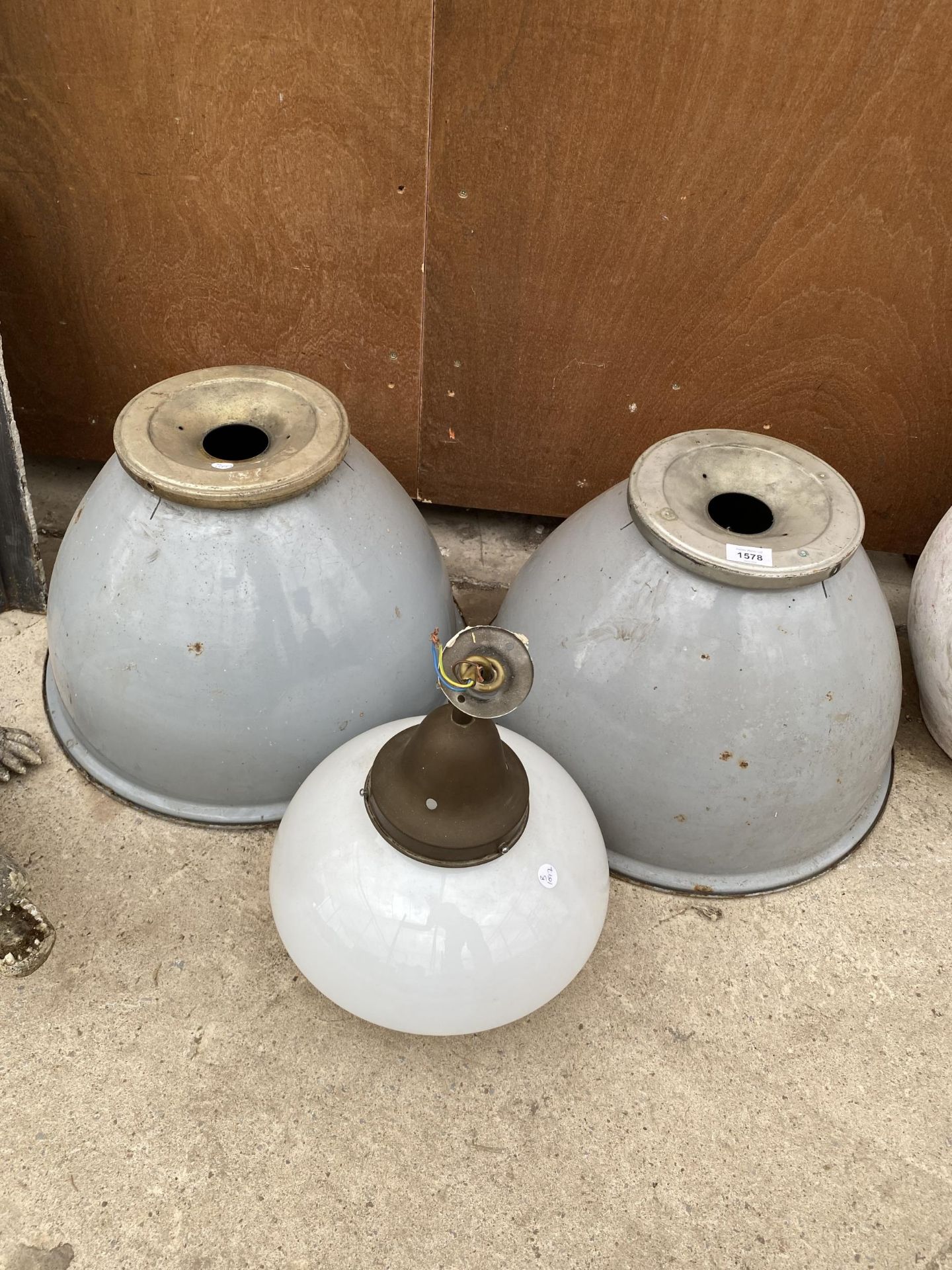 TWO ENAMEL INDUSTRIAL LIGHT SHADES AND A GLASS LIGHT FITTING