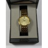 A BOXED GOLD PLATED SEIKO QUARTZ DATE WATCH