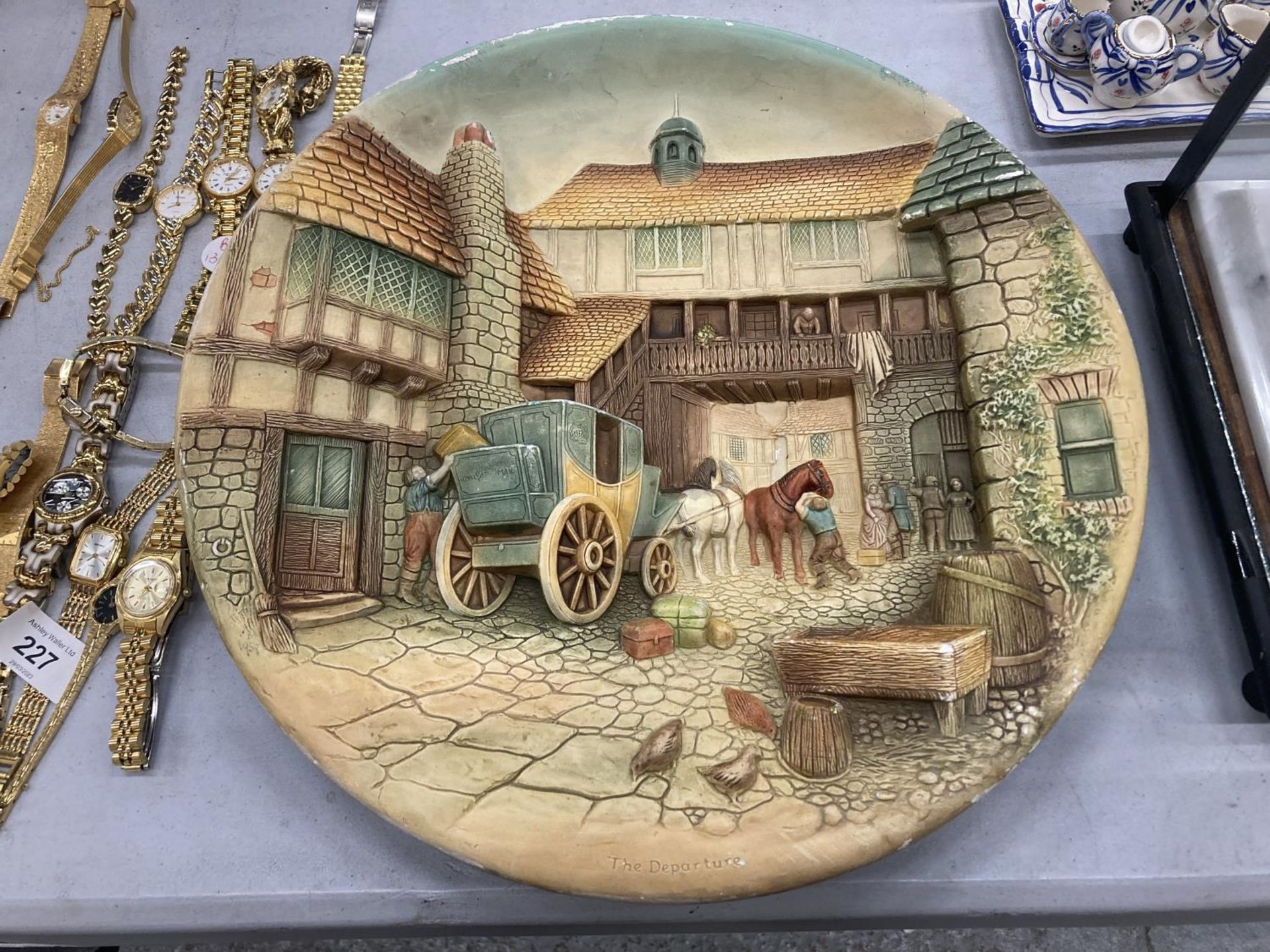 A LARGE 3-D HANDPAINTED PLAQUE BY BOSSUNS