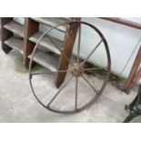 A 39" DIAMETER CAST IRON EIGHT SPOKE WHEEL, G.OWEN + SON, MARKET DRAYTON