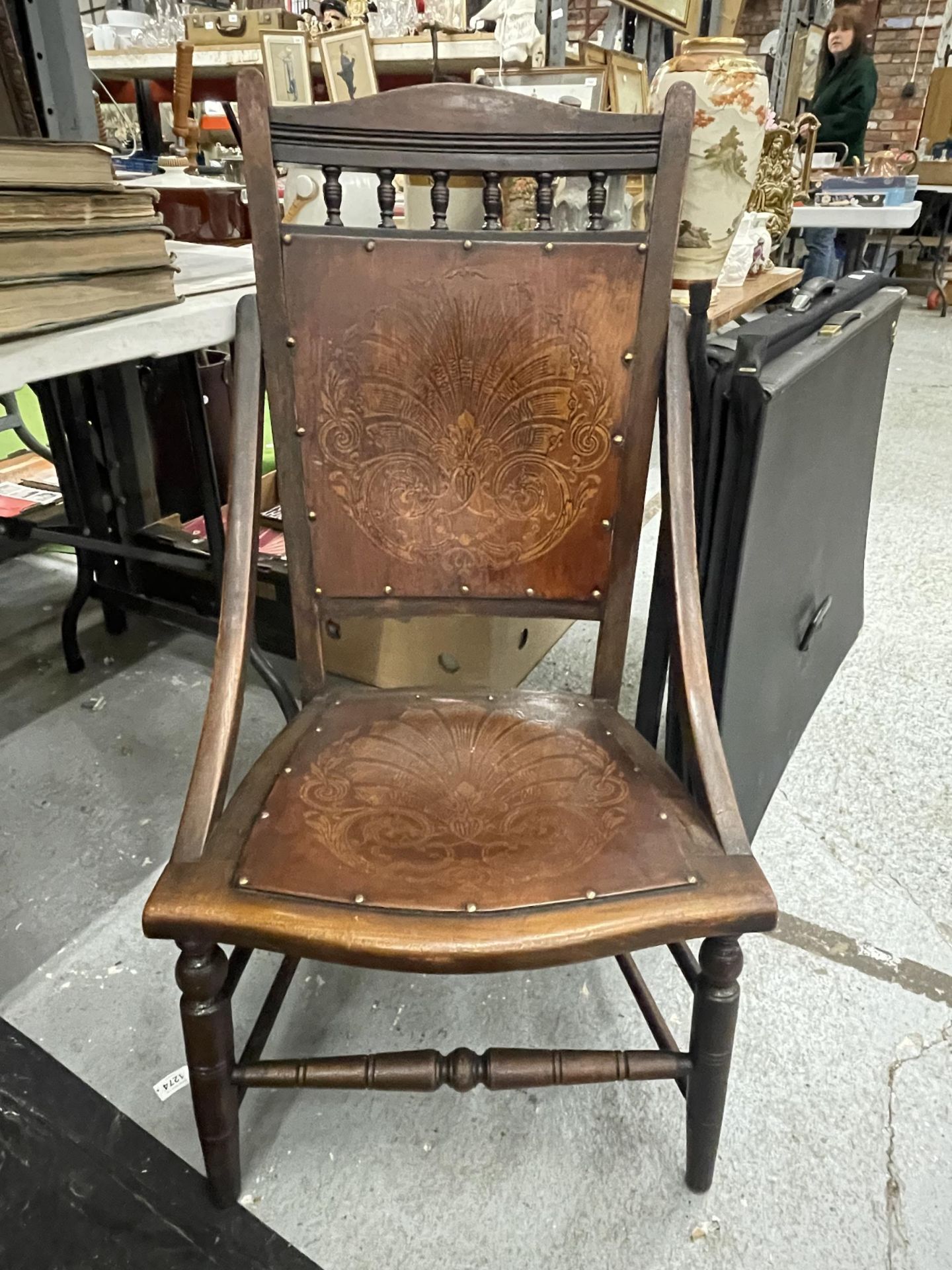 AN ART NOUVEAU CHAIR WITH FLORAL DESIGN SEAT AND BACK