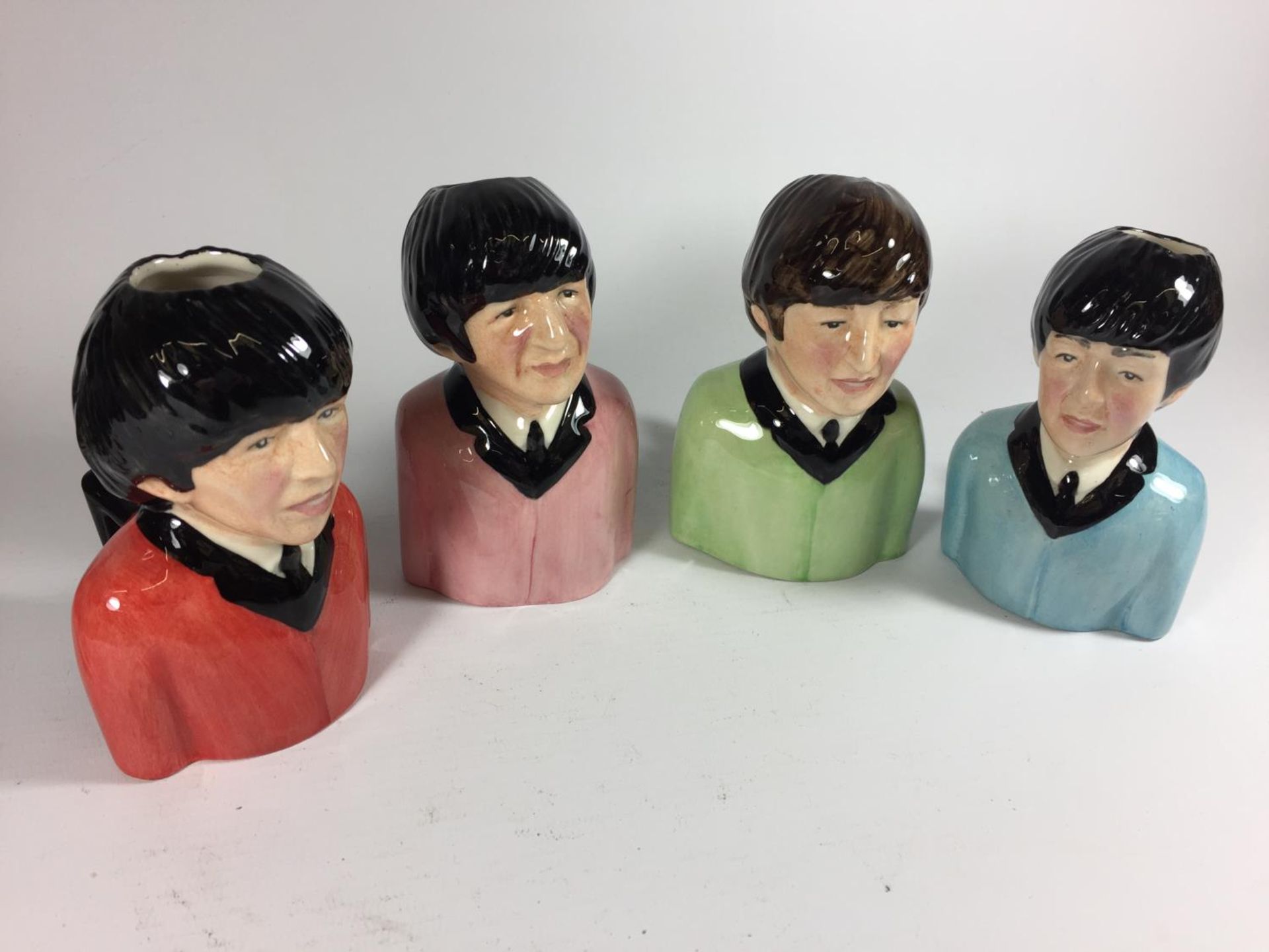 A SET OF FOUR BAIRSTOW LIMITED EDITION BEATLES TOBY JUGS