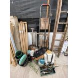 A LARGE ASSORTMENT OF VINTAGE GARDEN TOOLS TO INCLUDE SPADES, SHOVELS AND PLANT POTS ETC