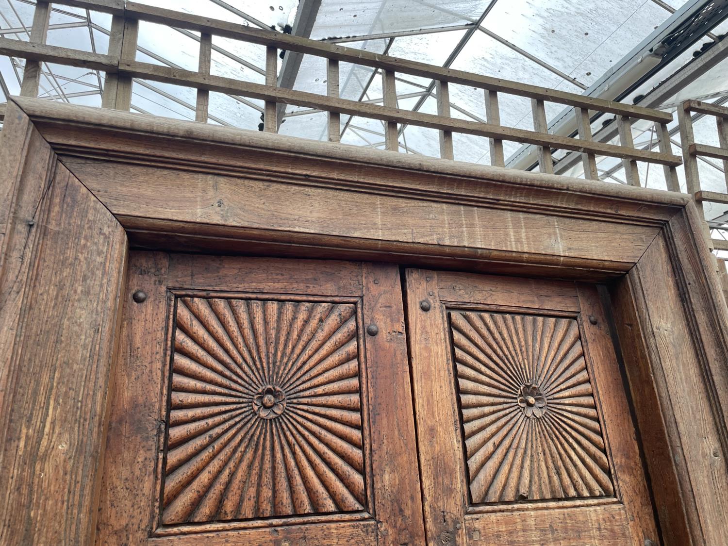 A PAIR OF INDIAN HARDWOOD DOORS WITH DECORATED PANELS + BRASS FITTINGS, 90 X 54" TO INCLUDE FRAME - Image 2 of 5