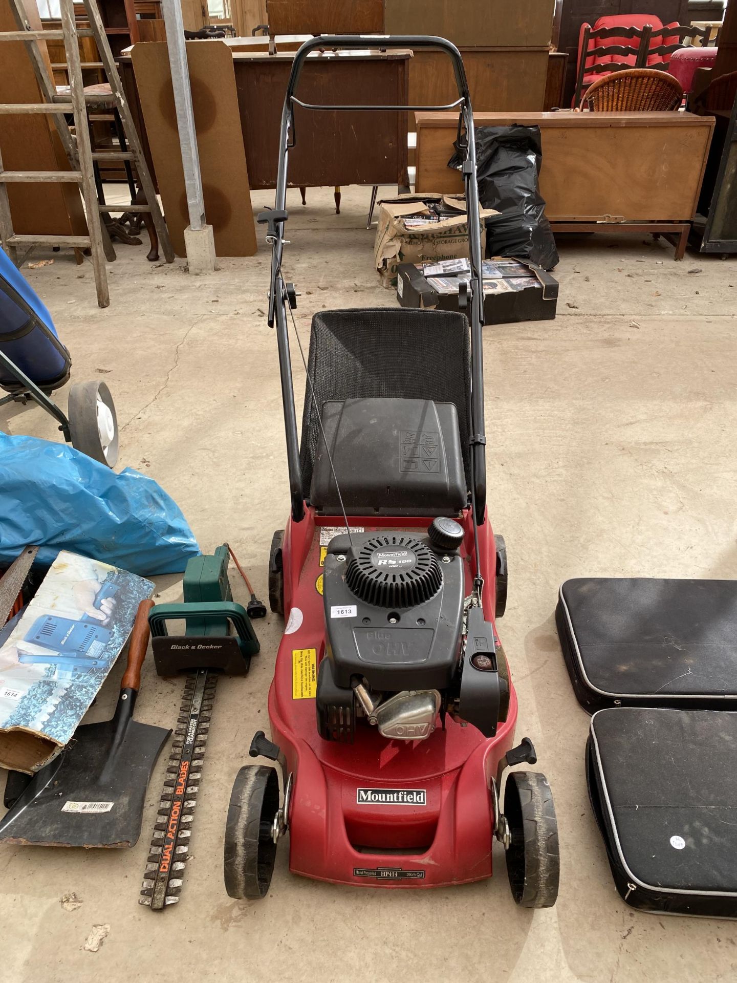 A MOUNTFIELD RS100 PETROL LAWN MOWER COMPLETE WITH GRASS BOX